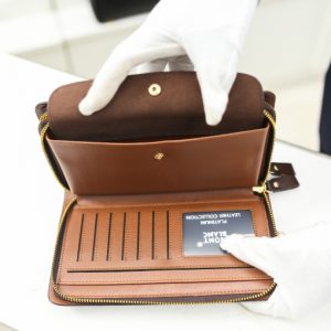 Ví cầm tay nam da thật